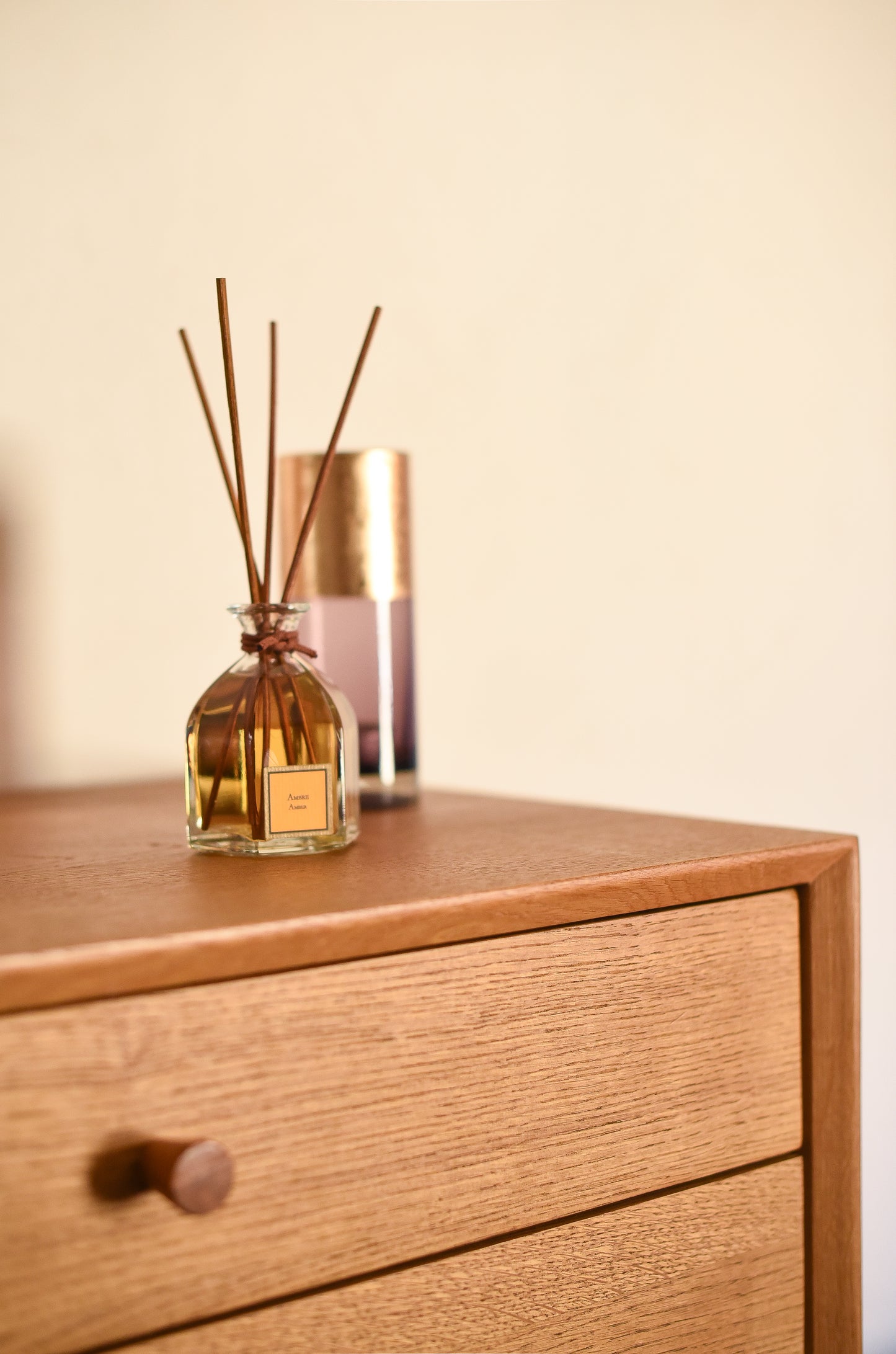 Amber Reed Diffuser, on a cupboard