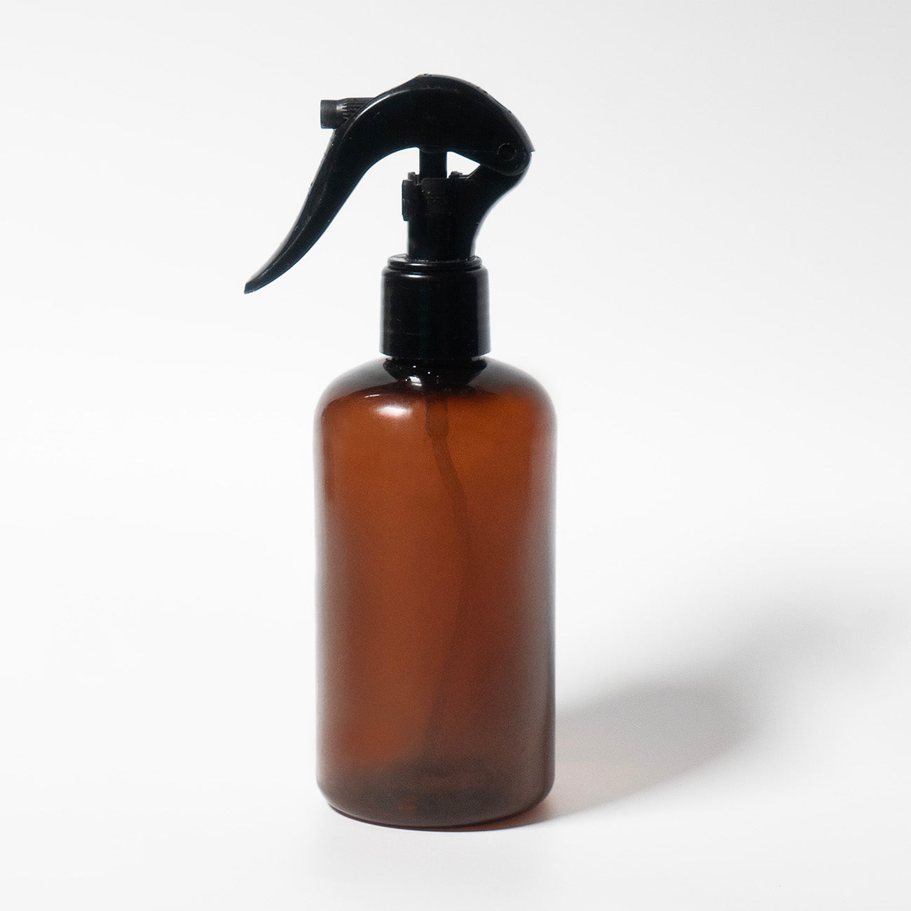 A spray bottle to be used with botani bloom neem oil, front view