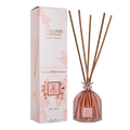 Collines de Provence rose and hibiscus  500ml large reed diffuser bottle with wooden sticks and packaging on a white background