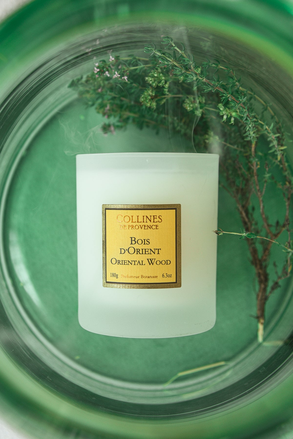 Oriental Wood Scented Candle, with background