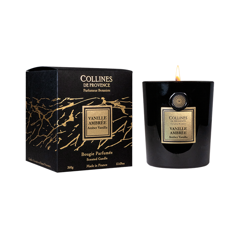 Collines de Provence amber vanilla scented candle and packaging on a white background