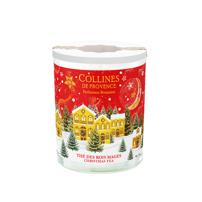 Collines de Provence 180g Christmas tea scented candle with festive christmas design on a white background
