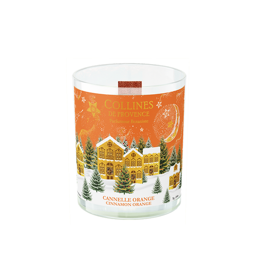 Botani Bloom 75g cinnamon orange scented candle with a festive christmas design featuring a house and trees