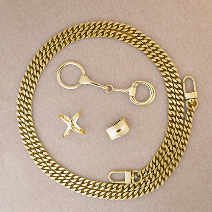 Botani Bloom silk scarf accessories including a Gold chain with clasps on a beige background