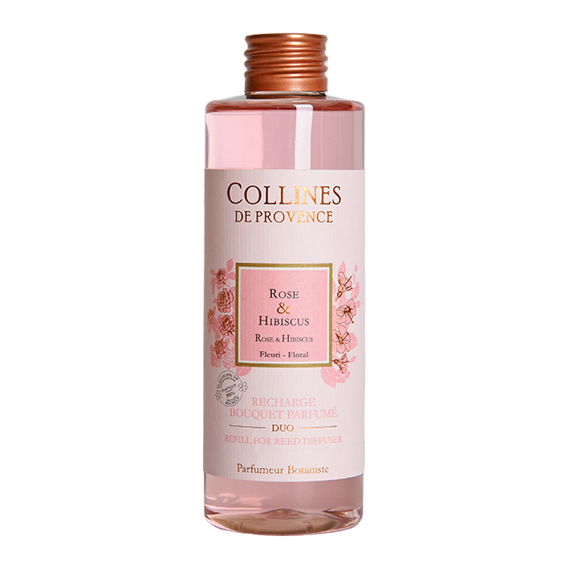 Collines de Provence Rose and hibiscus diffuser refill bottle with pink label on a white background