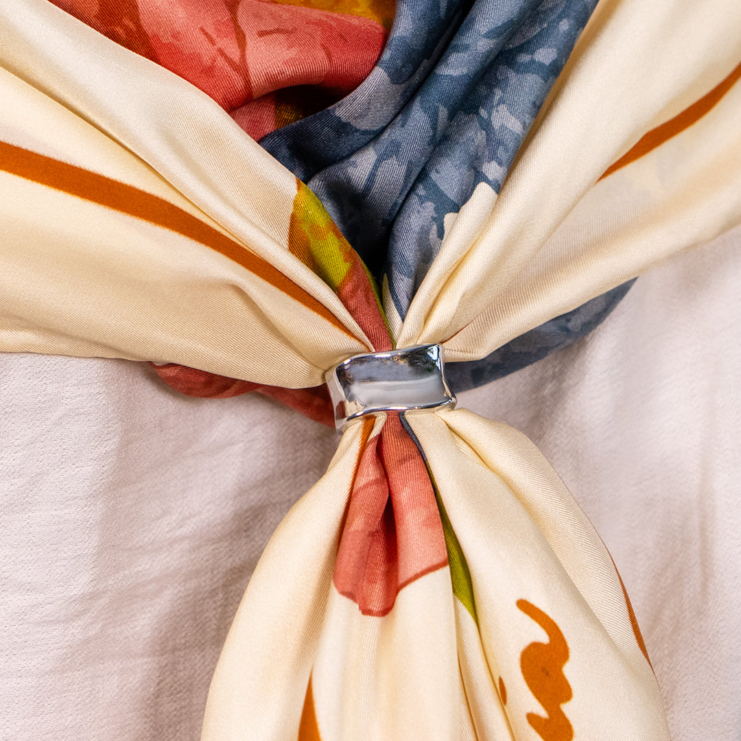 Silver scarf accessory showing how to style with a botani bloom silk scarf