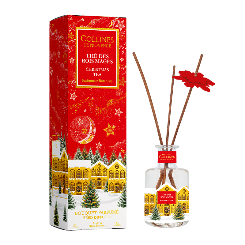 Collines de Provence Christmas tea reed diffuser with red packaging and diffuser bottle on a white background