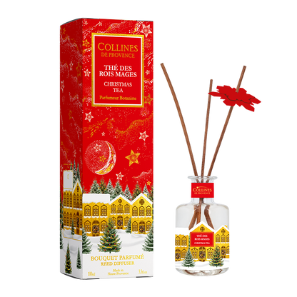 Collines de Provence Christmas tea reed diffuser with red packaging and diffuser bottle on a white background